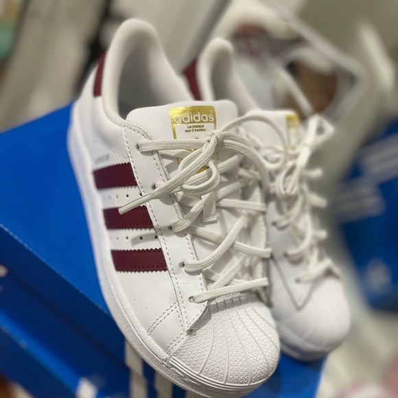 maroon and white shell toe adidas